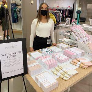 A woman selling stationary