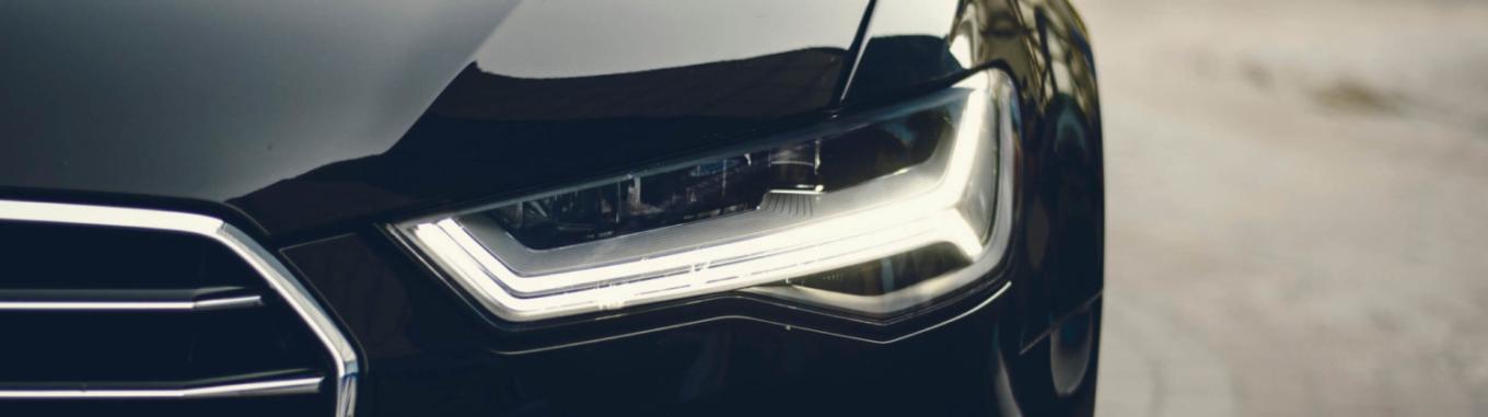 Black car, chrome grill, metallic paint