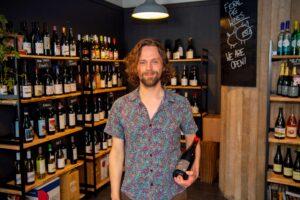 Dave Cushley, founder of Feral Pigs standing in his store