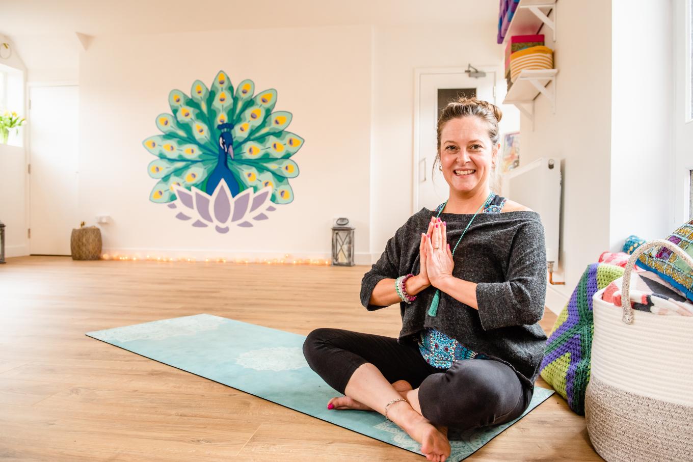 Portrait of Jenna Blair in a Yoga pose